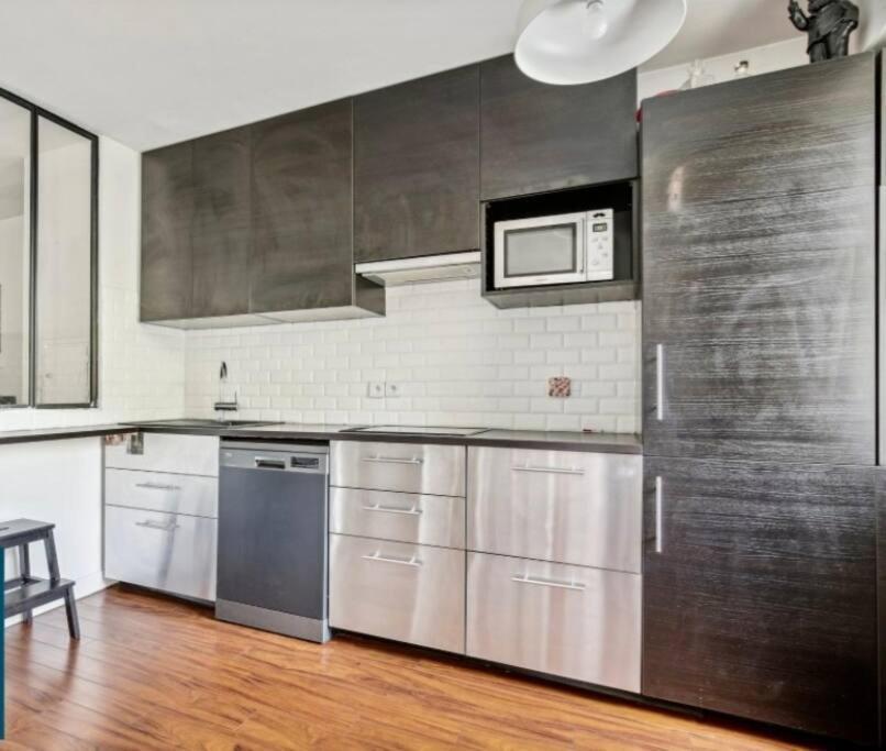 Paris : Appartement Familial Avec Parking Prive Clichy Exterior photo